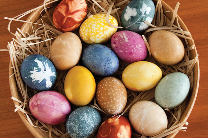 naturally colored easter eggs in a basket